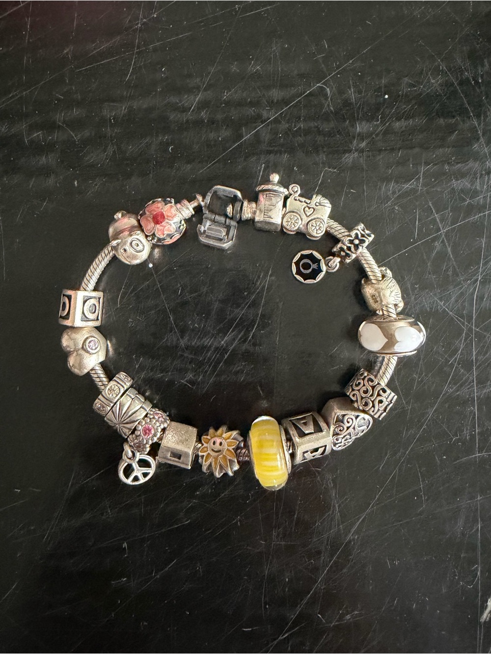 Pandora Silver Charm Bracelet with various charms. - Picture 2 of 3